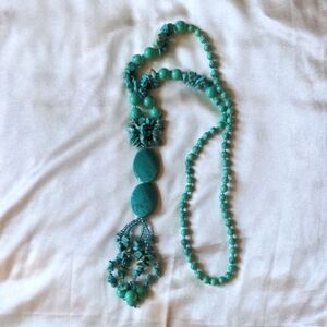 Long turquoise stone and beaded necklace. New without tag